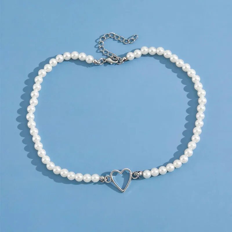 Collier de perles en forme de cœur d'amour